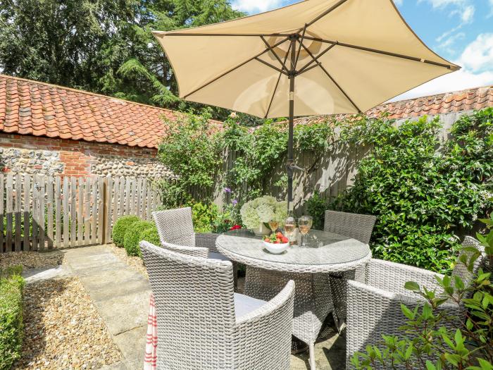 Bridge Cottage, is in Aylsham, Norfolk. Two-bedroom, characterful cottage. Private, enclosed garden.