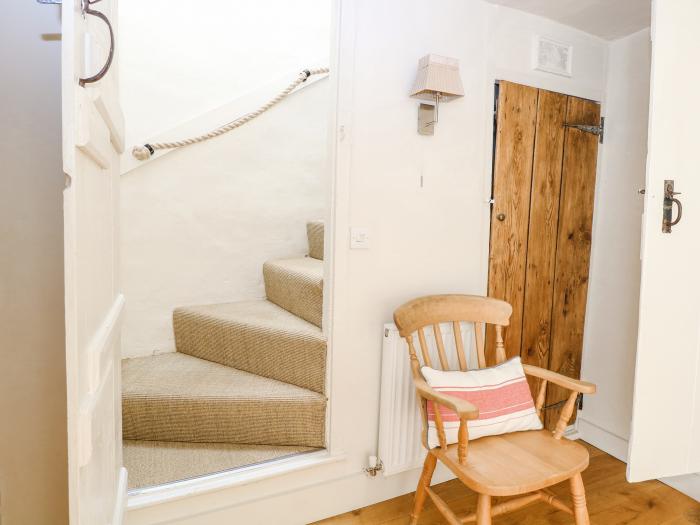 Bridge Cottage, is in Aylsham, Norfolk. Two-bedroom, characterful cottage. Private, enclosed garden.