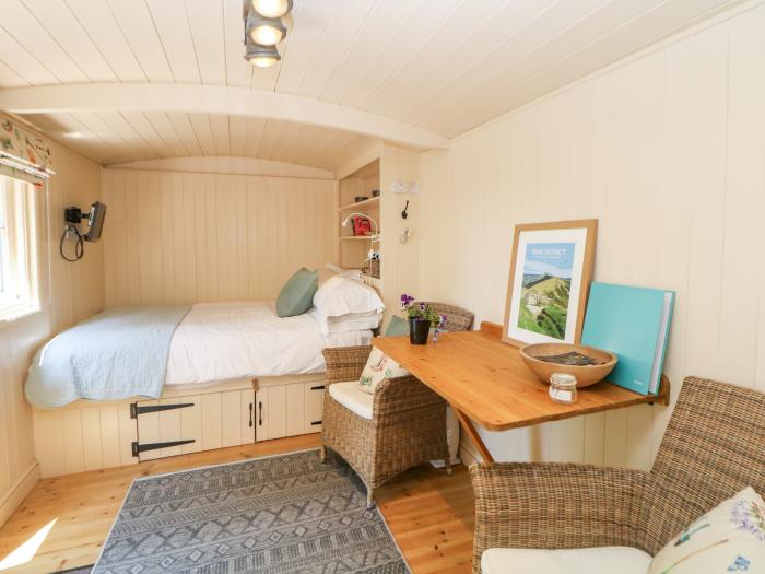 Shepherd's Hut is in Castleton, in Peak District. Pet-free. Woodburning stove. Near a National Park.