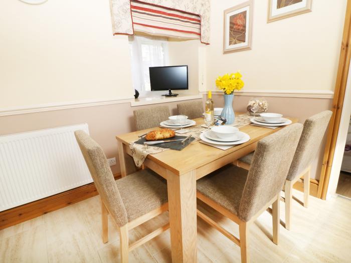 Beudy rests in Dyffryn Ardudwy, in Gwynedd. Two-bedroom home near beach and amenities. Private patio