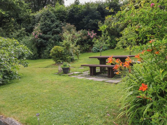 The Cow's Cupboard, Carmarthen, Carmarthenshire. Two-bedroom cottage with pretty garden. Near pub