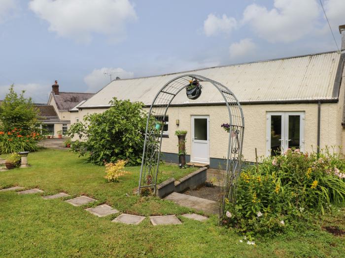 The Cow's Cupboard, Carmarthen, Carmarthenshire. Two-bedroom cottage with pretty garden. Near pub