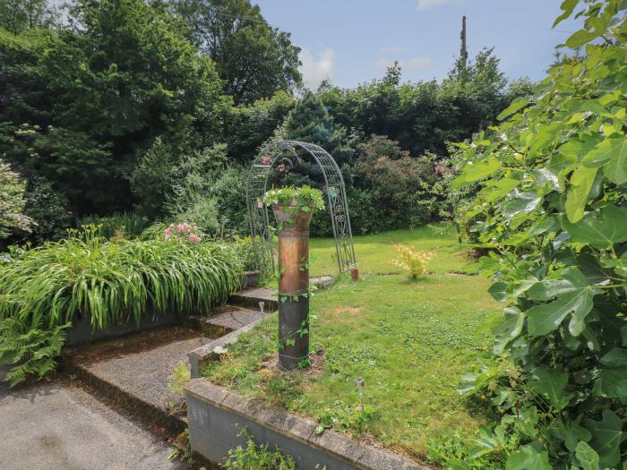 The Cow's Cupboard, Carmarthen, Carmarthenshire. Two-bedroom cottage with pretty garden. Near pub