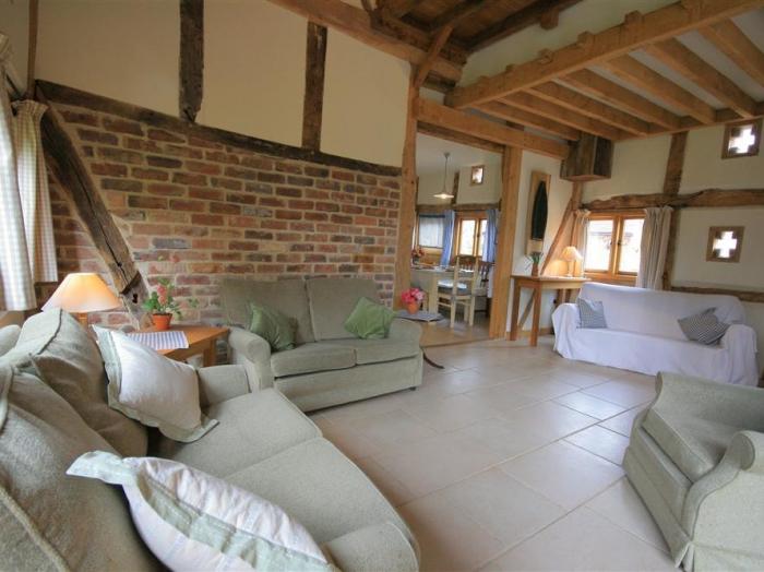 Whites Farm Barn, in Ledbury, Herefordshire. Near AONB. Three-bed barn conversion with garden. Rural