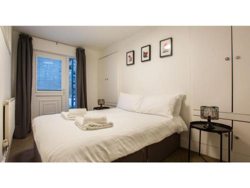 Elegant 1BDR w/private garden in vibrant Brighton