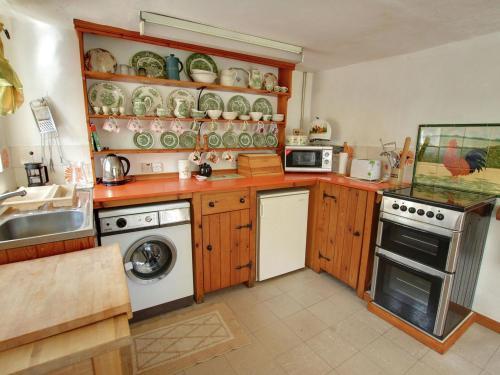 Rustic Cottage in Slaughterford with Fireplace